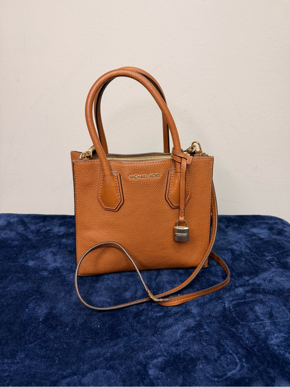 Michael Kors Mercer Medium Messenger Handbag in a Tan or Luggage Color